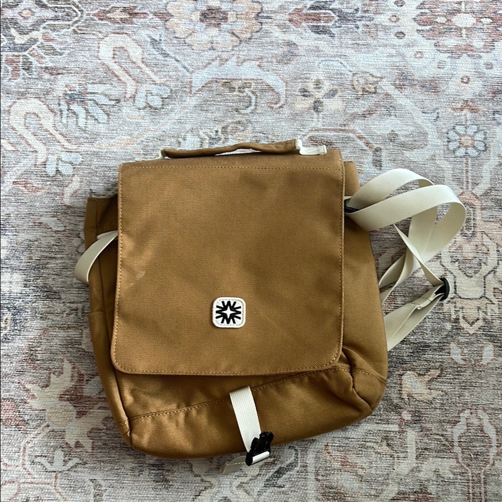 Tan and White Canvas Backpack with Flap Closure